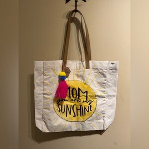 Tote bag featuring the phrase "Mom You Are My Sunshine". NWT